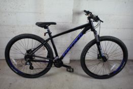 A Carrera Hellcat 29 mountain bike with aluminium
