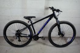 A Carrera Hellcat 29 mountain bike with aluminium