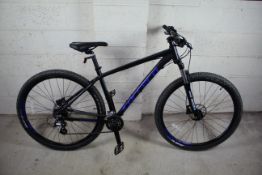A Carrera Hellcat 29 mountain bike with aluminium