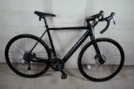 A Orbea Gain electric road bike, having Shima