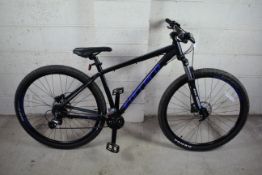A Carrera Hellcat 29 mountain bike with aluminium