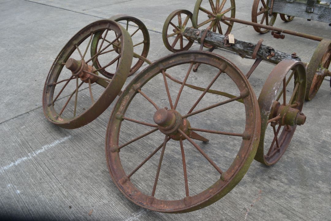 Set of four matching cast wheels on axles. Suit shepherds hut. - Image 1 of 6
