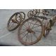 Set of four matching cast wheels on axles. Suit shepherds hut. - Image 1 of 6