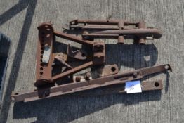 Various Massey Ferguson drawbar parts.