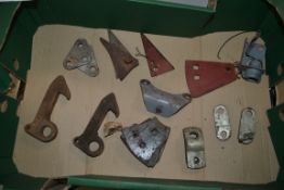 Various Ferguson and Massey Ferguson tractor brackets, including mower chain brackets, check chain