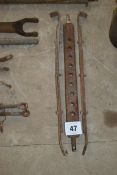 9-hole draw bar and Massey Ferguson stays.