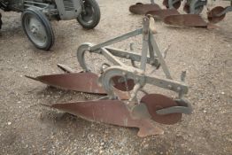 Ferguson 2 furrow plough. With discs and skimmers. Model 10G-AE-A28. Badged.