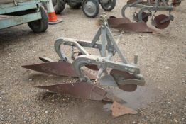 Ferguson 2 furrow plough. With discs and skimmers. Model 10-AE-28. Serial number 036794. Badged.