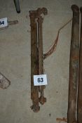 2x Ferguson top links, one with rack.