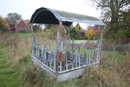 Skid mounted big bale feeder. With roof. Included by kind permission. V