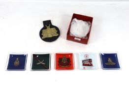 A quantity of glass regimentally marked ash trays