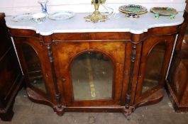 A Victorian walnut credenza, surmounted by a white