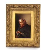 19th Century continental school, peasant woman wearing a headscarf, oil on canvas in gilt frame,