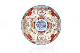 A large 19th Century Imari charger, 47cm dia.