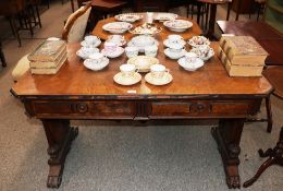 A 19th Century pollard oak two drawer library tabl