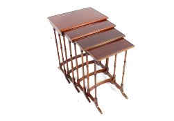 A nest of Edwardian mahogany and chequer banded occasional tables, 51cm wide in extremes