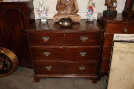A George III mahogany chest of three long drawers, raised on bracket feet, 95cm wide x 54cm deep x