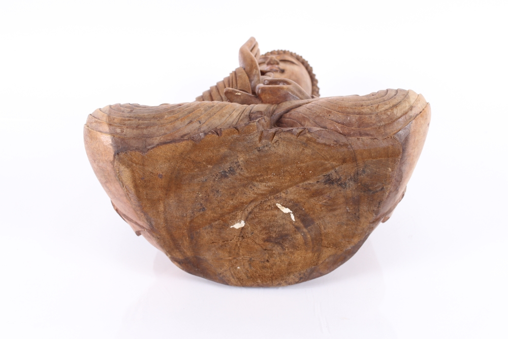 A large carved wooden figure of a seated Buddha, 52cm high - Image 2 of 2