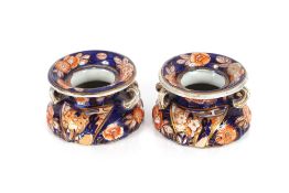 A rare and unusual pair of Masons stoneware Imari decorated table spittoons in the 