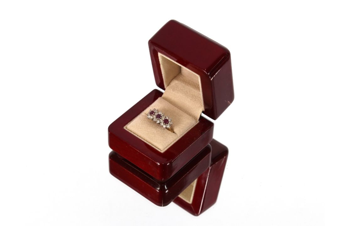 An 18ct gold diamond and ruby set ring - Image 2 of 8