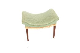 A mahogany framed curved dressing stool, raised on square tapering supports, 63cm