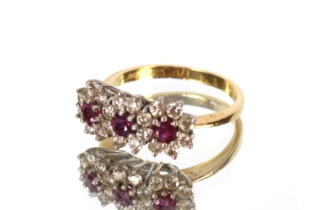 An 18ct gold diamond and ruby set ring - Image 1 of 8