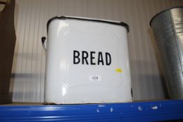An enamel bread bin