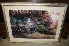 A framed coloured print depicting a girl picking f