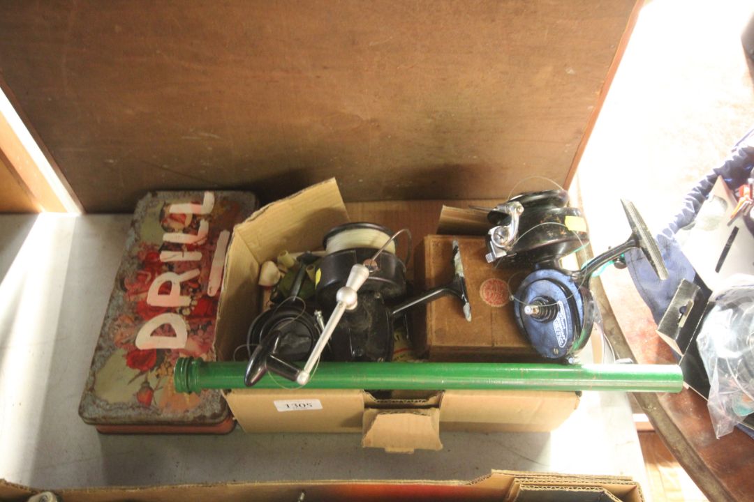 A K.P.Morritts Intrepid Surf cast vintage fishing reel, a Mitchell 302 salt water fishing reel and