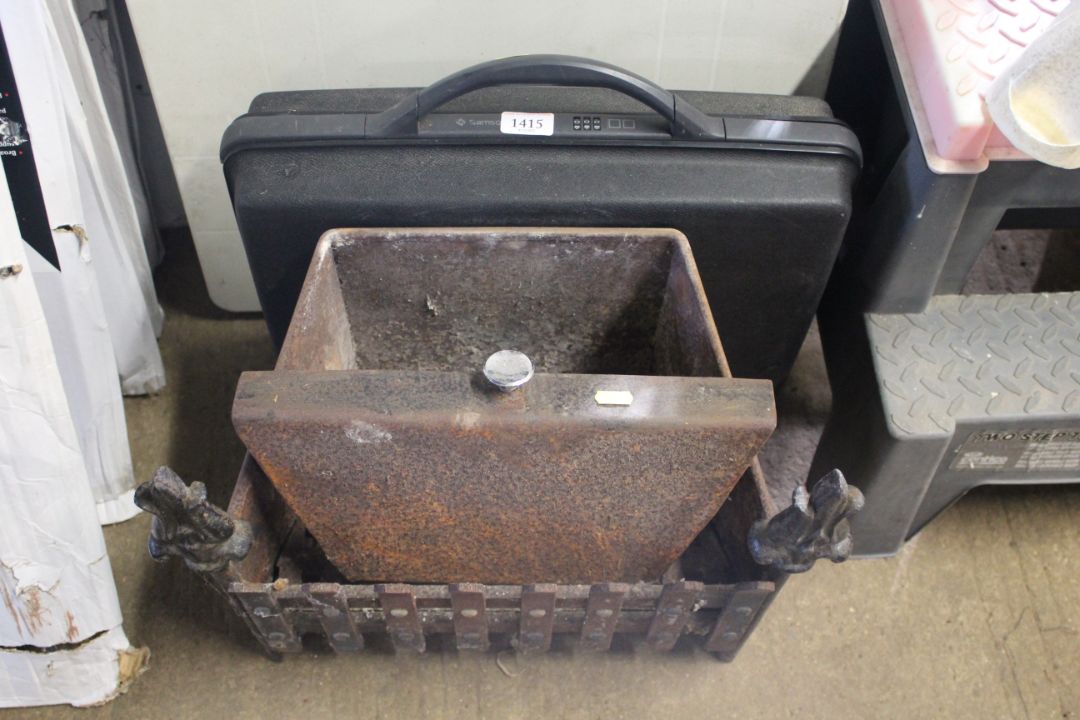 A Samsonite briefcase and a cast iron fire basket