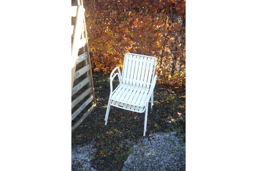 Two white garden chairs
