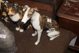 A Winstanley Pottery model of a whippet with glass