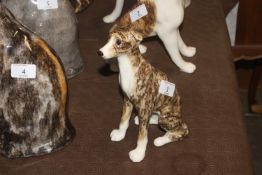 A Winstanley Pottery model of a whippet with glass