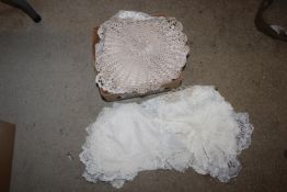 A box containing crochet items, needles, lace etc.