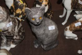 A Winstanley Pottery model of a cat with glass eye
