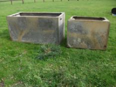 Two galvanised water tanks