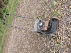 Old petrol lawnmower,