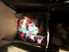 Box of Porci chewy pig toys,