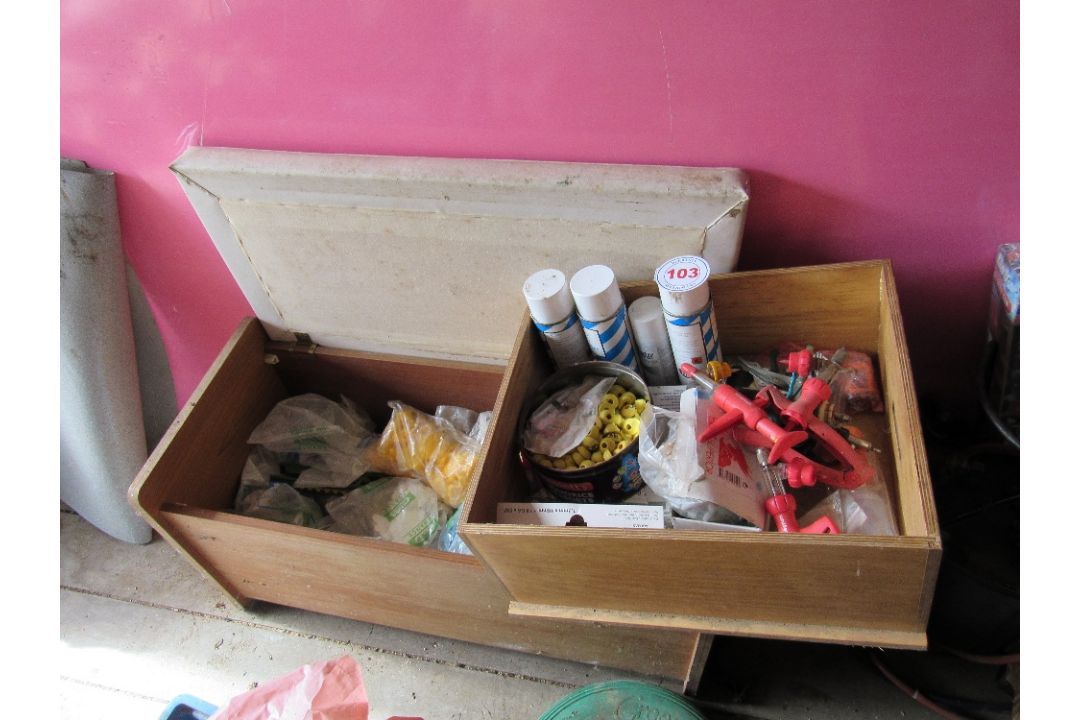 Box of pig sundries and box of ear tags