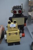 Two Toy Battery Powered Robots