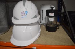 *Three Hardhats, Electric Kettle, and a Cafetiere