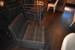 *Four Outdoor Rattan Chairs and a Low Chair