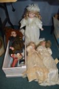 Four Classic Porcelain Dolls