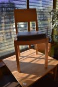 *Twelve Beech Framed Chairs with Upholstered Seat Pads in Brown Faux Leather
