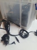 * box of power cables, etc