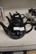 Three Black Teapots
