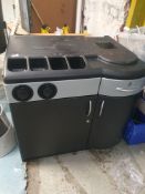 * coffee station table - includes storage space under, bin chute cupboard, disposable lid dispenser,