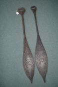 Two Carved Ironwood Paddles