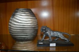 Tiger Ornament and a Metal Vase
