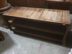 * low level table with shelves on castors - 1400w x 500d x 600h